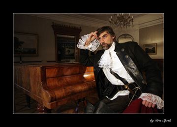 A musketeer lost in thought at the piano