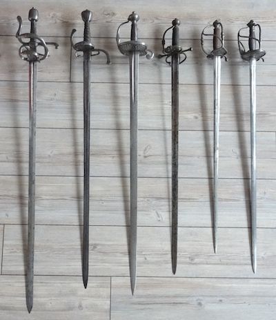 Six épées alignées, de la rapière à l'épée de cour